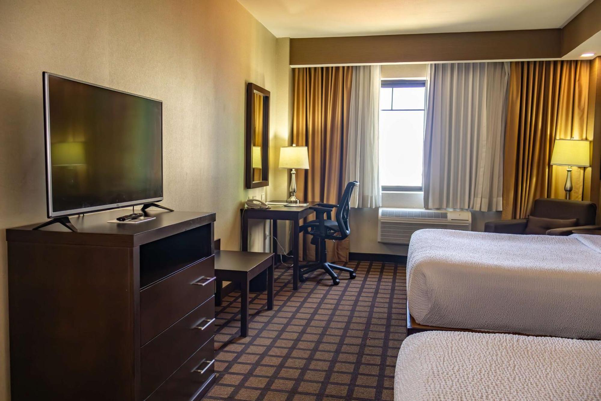 Best Western PREMIER Monterrey Aeropuerto Apodaca Exterior foto A typical room at the Hilton Garden Inn